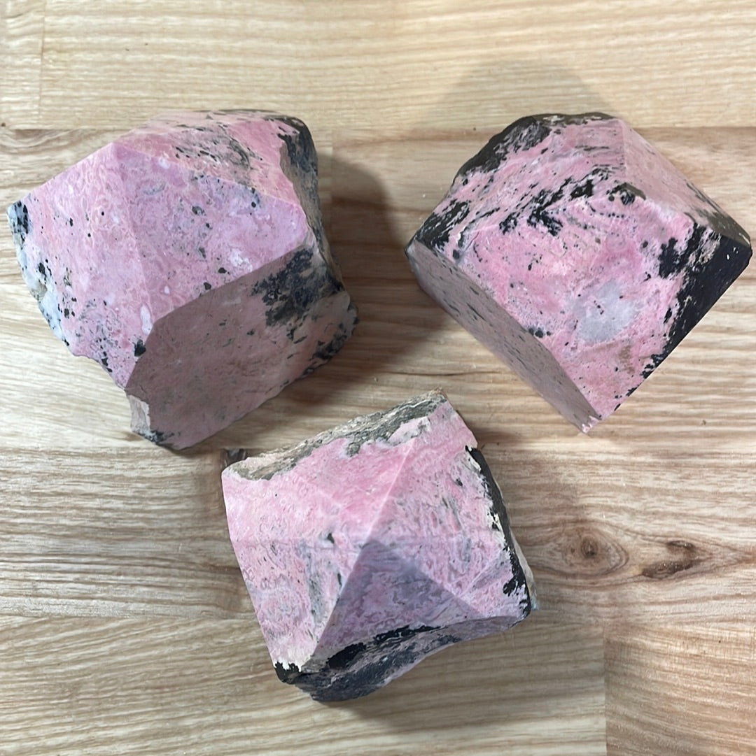Rhodonite Raw with cut and polished point